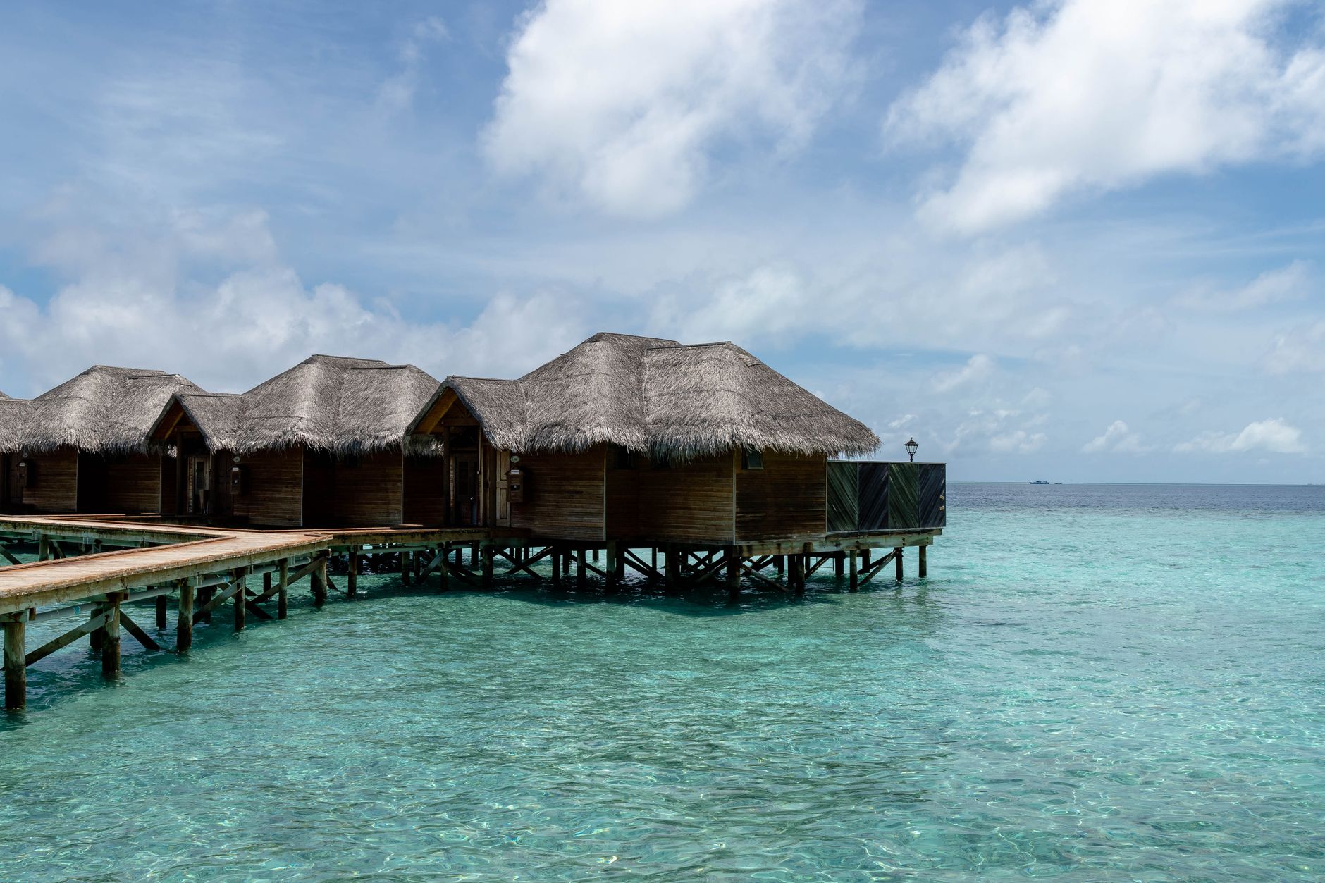 Overwater villas on a structured luxury holiday
